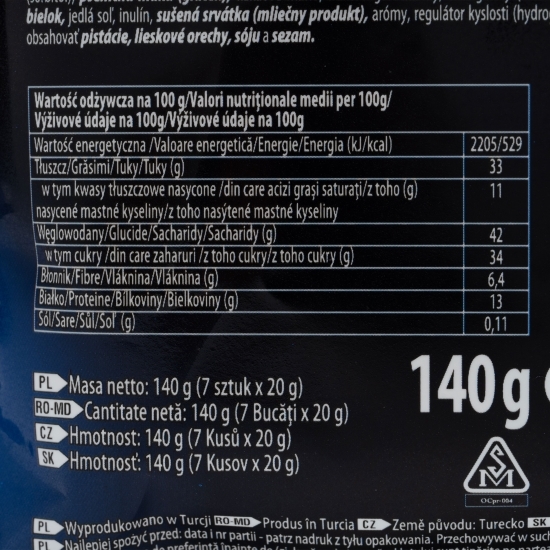 Mini batoane cu interior de nuga și caramel învelit în bucăți întregi de arahide și glazură de ciocolată neagră 140g